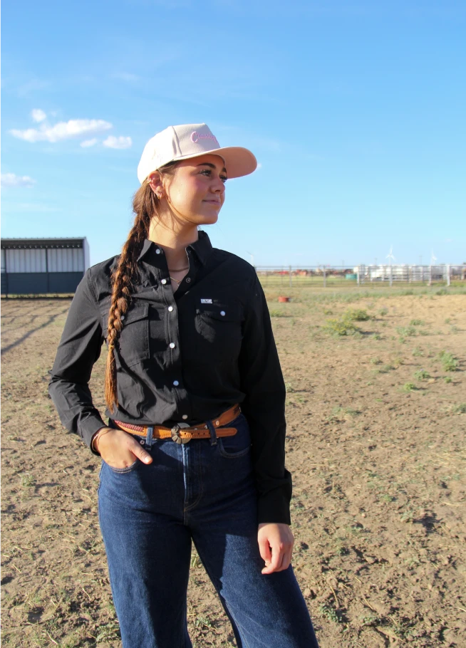 Woman wearing shirt from Saddle Society Signature Box